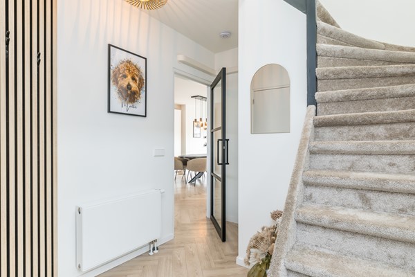 Foto - Verkocht onder voorbehoud: Instapklare gemoderniseerde geschakelde 2 onder 1 kap woning  met aanbouw, open keuken, tuin en garage in Voerendaal